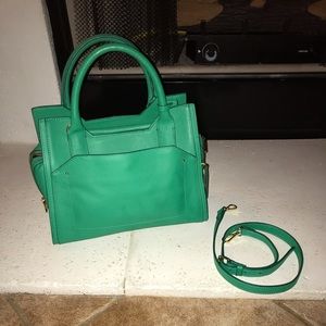 Vince Camuto Handbag with crossbody strap.